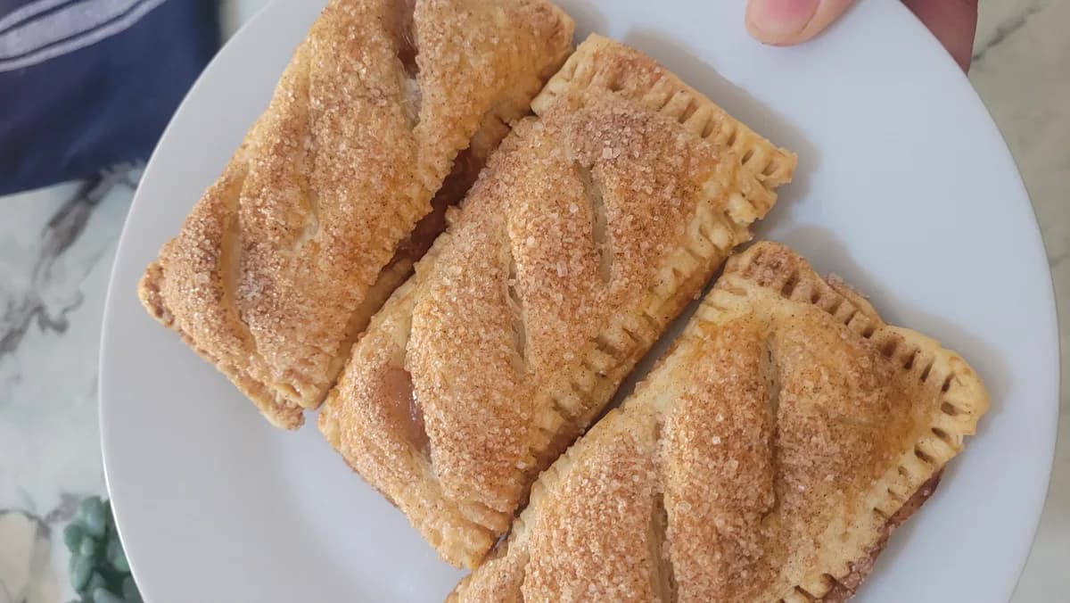 Golden homemade apple pastries with a flaky crust