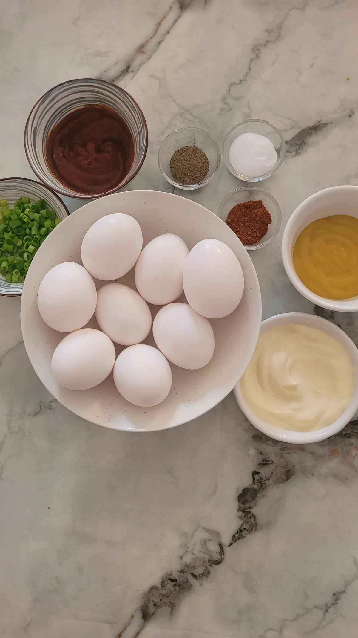 A platter of finished stuffed eggs