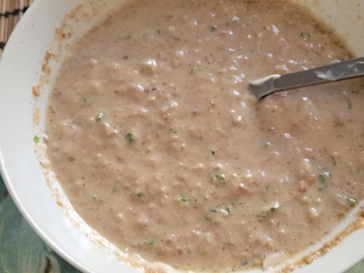 Creamy tuna sandwich filling mixed in a bowl